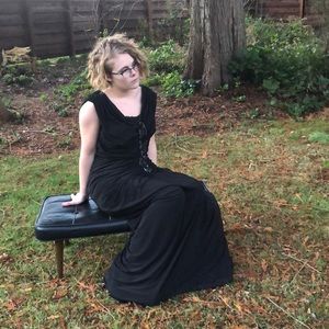 Deep V neckline bedazzled black gown